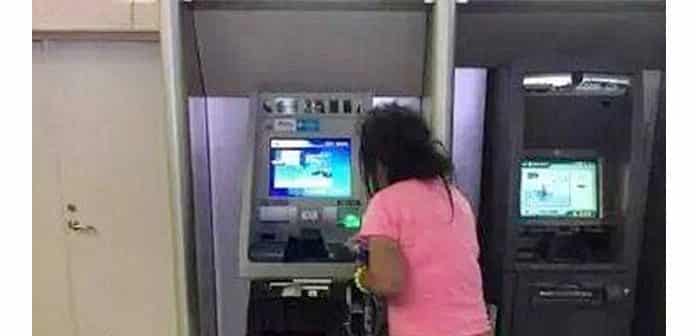 Angry woman rips apart ATM machine after she believed it had swallowed her card