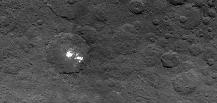 NASA’s Dawn takes close-ups of Ceres’s strange white spots, no explanation yet