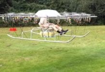 Man builds an awesome helicopter from 54 drones and garden chair