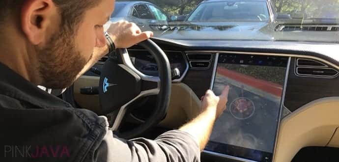 Man hacks Tesla to play Pokemon Go while driving