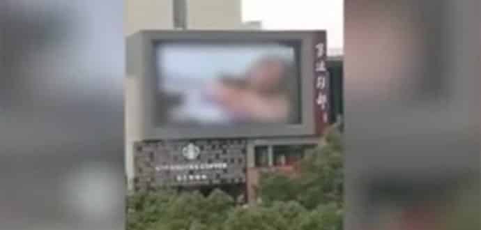 Porn played on giant Billboard at a China Mall leaves shoppers shocked